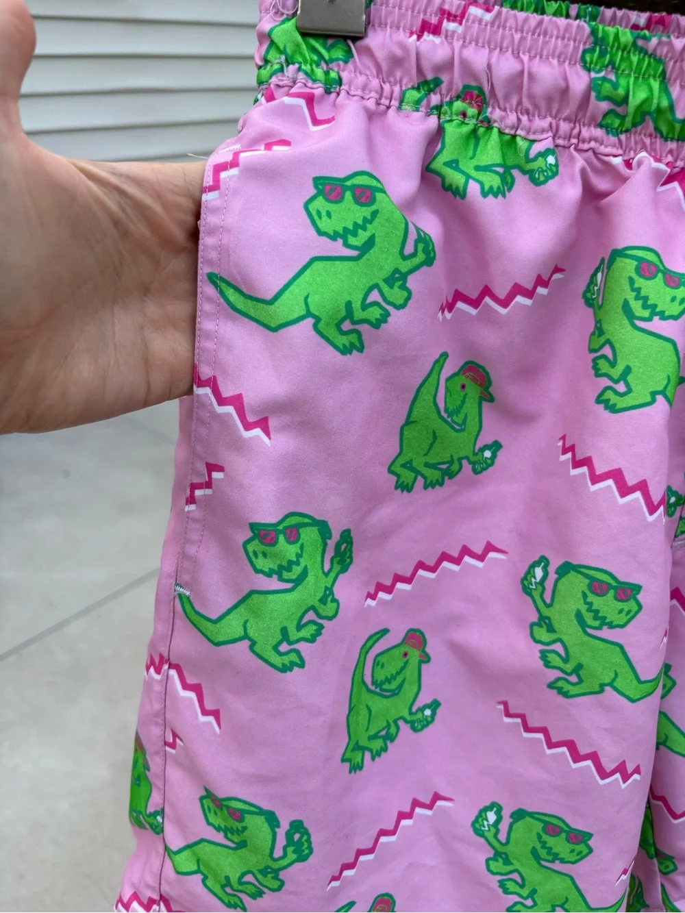 Tipsy Elves Men’s Pink Swim Shorts with Green Dinosaur Print- size M